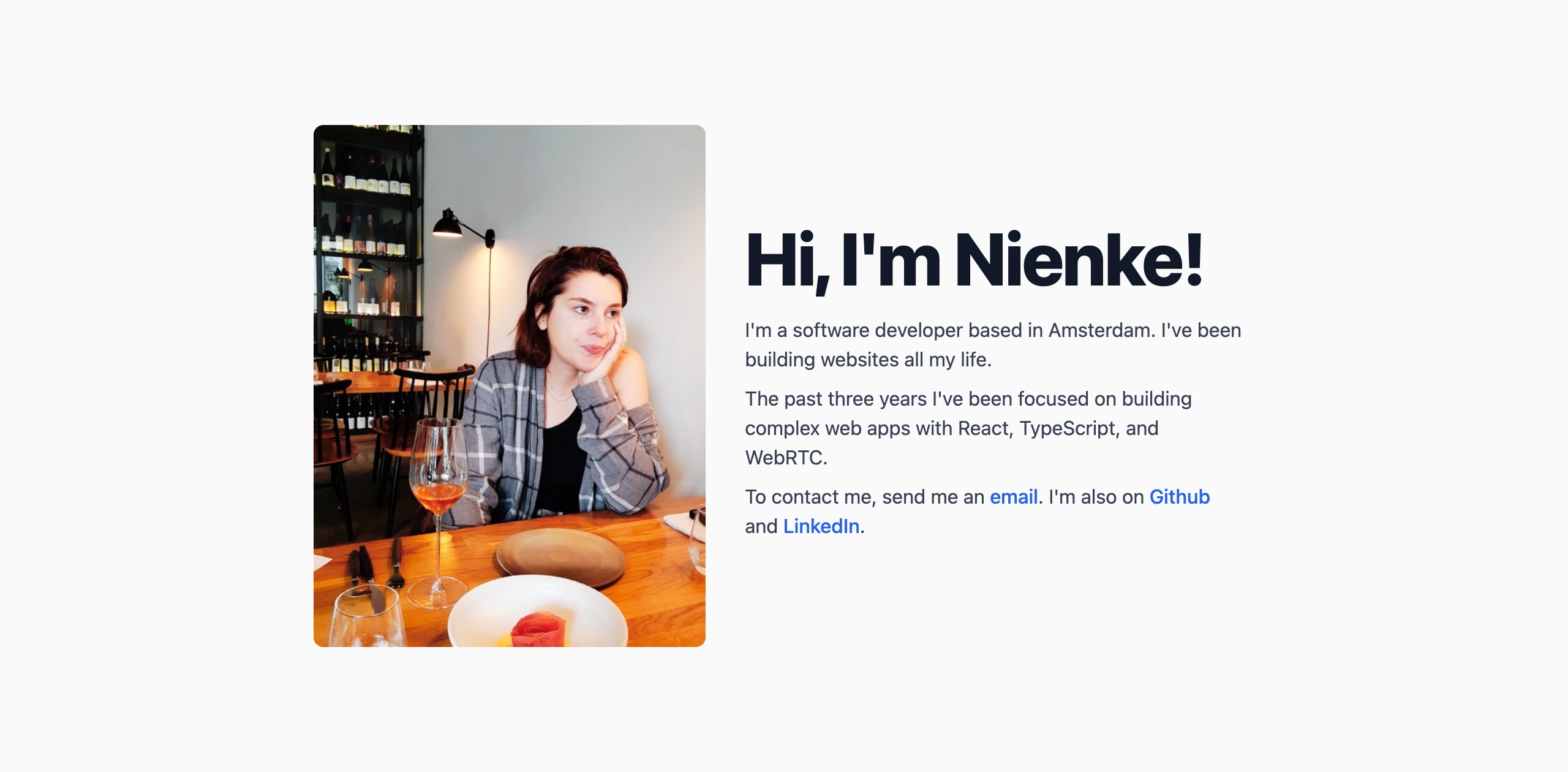 A light grey page with the same restaurant photo next to a bold Hi, I'm Nienke! heading and three short paragraphs